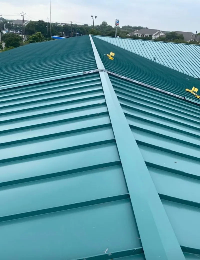 Green commercial metal roof ridge and valley for Metal Roof Repair in Moss Point